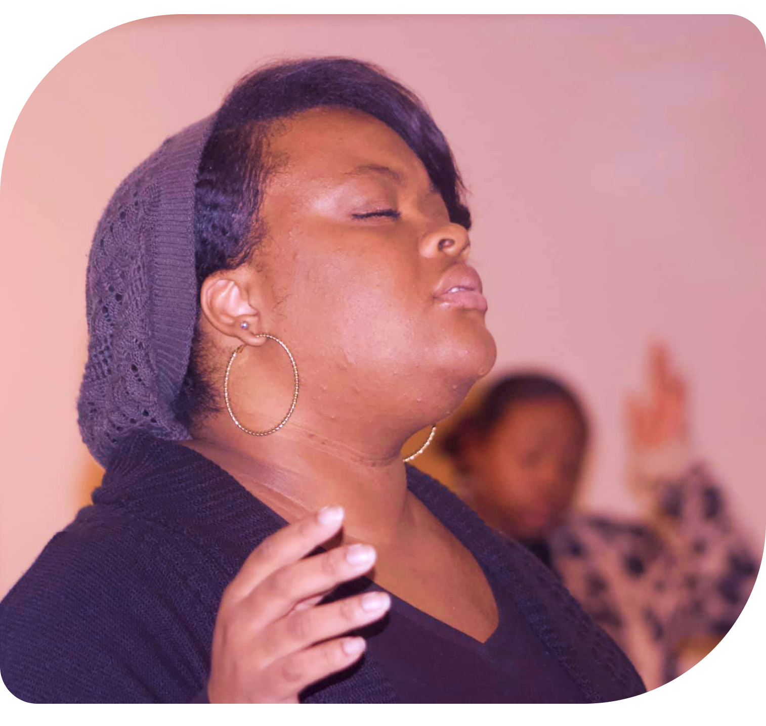 Photo of Lady during worship.